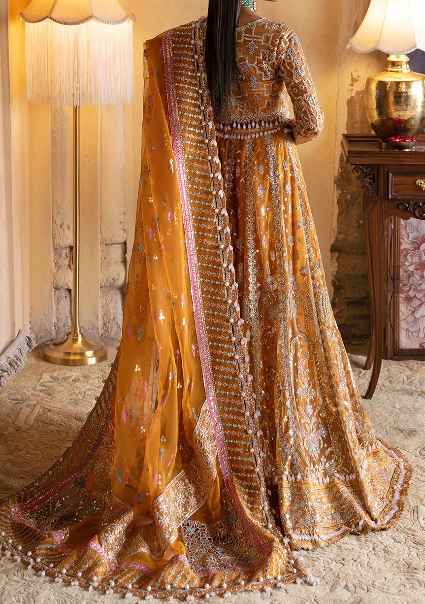 Pakistani Red and Golden Bridal Lehenga with Embroidered Kurti -